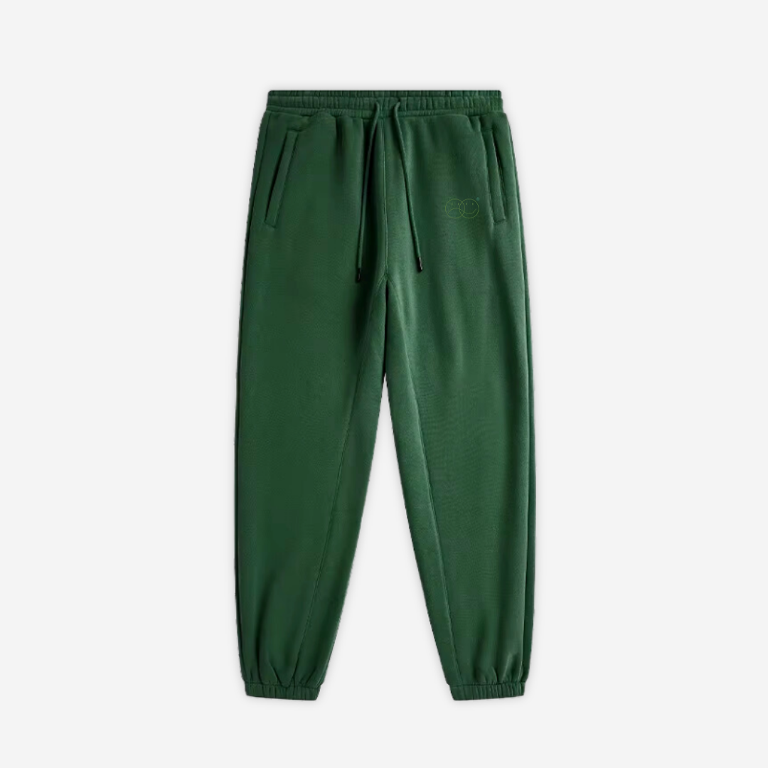 BASIC 'REINVENT' deep green sweatpants