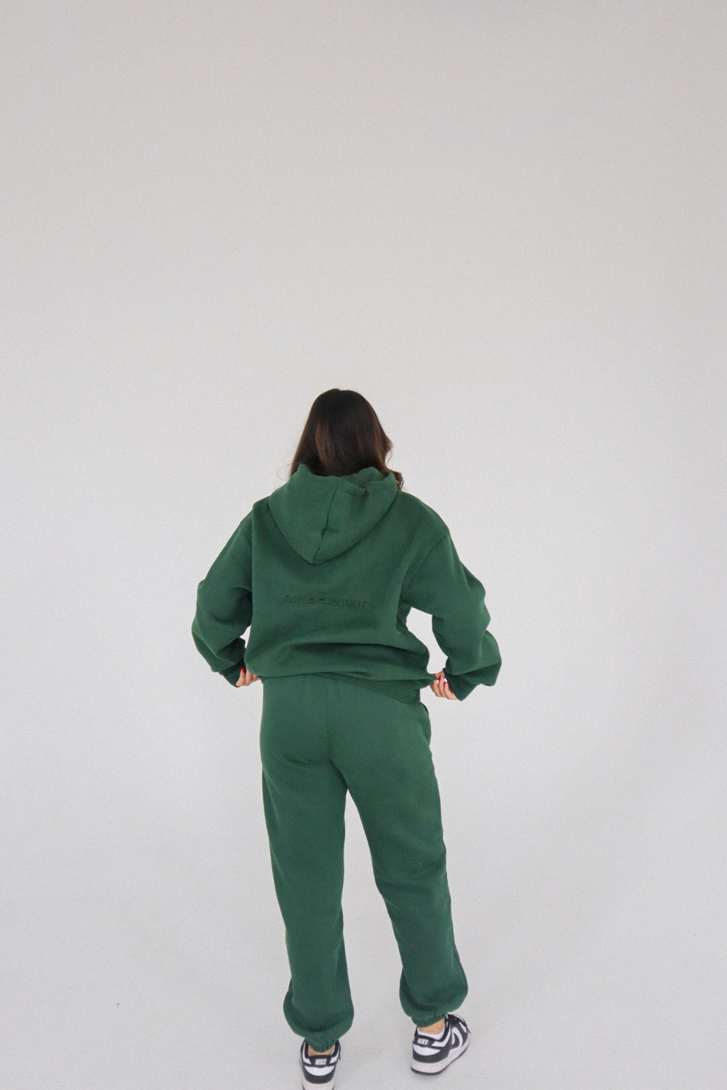 'REINVENT' SWEATS IN DEEP GREEN