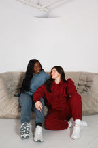 'REINVENT' HOODIE IN CRANBERRY