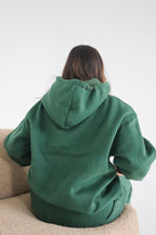 'REINVENT' HOODIE IN DEEP GREEN