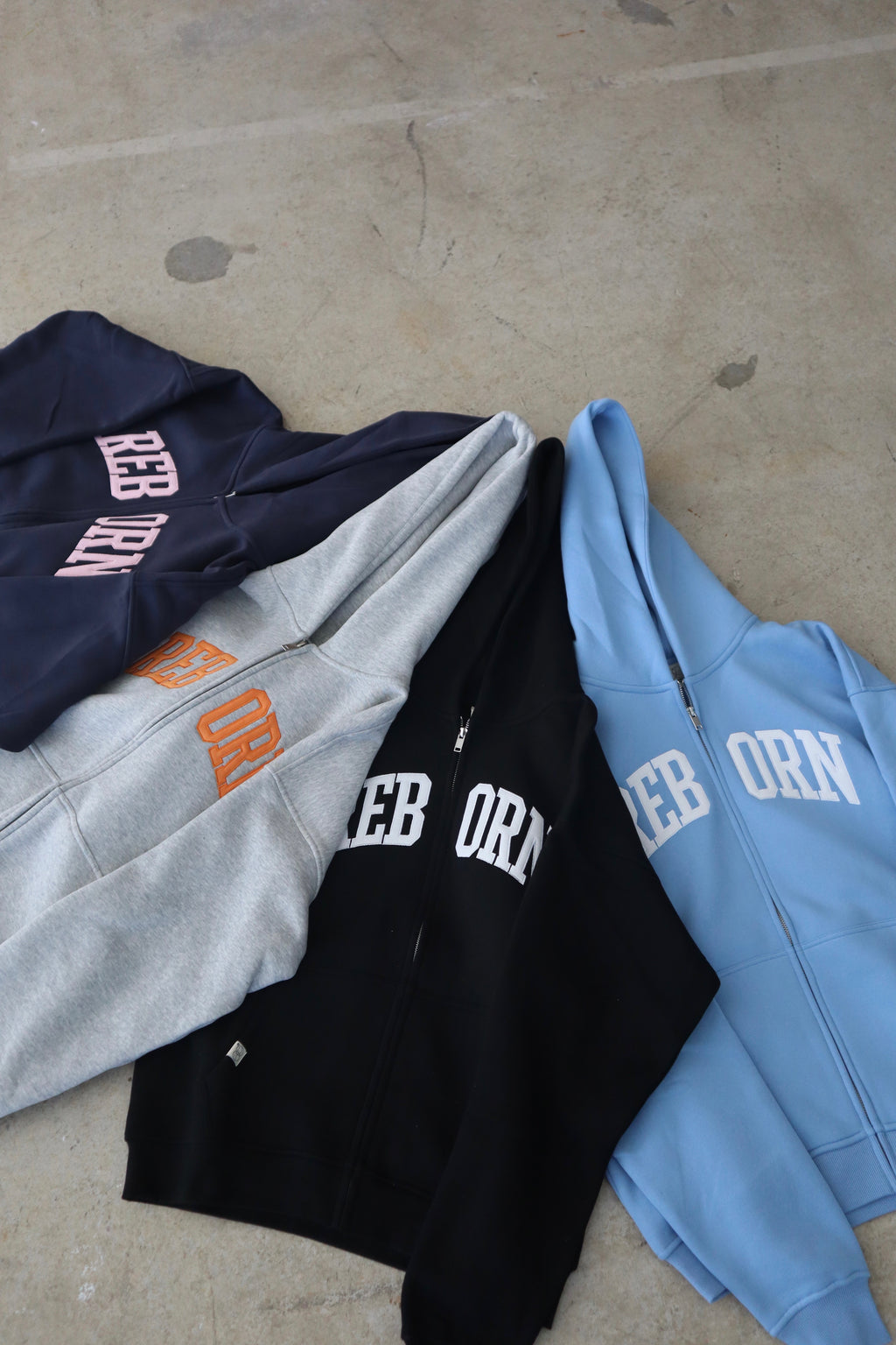 VARSITY ZIP HOODIE IN SKY