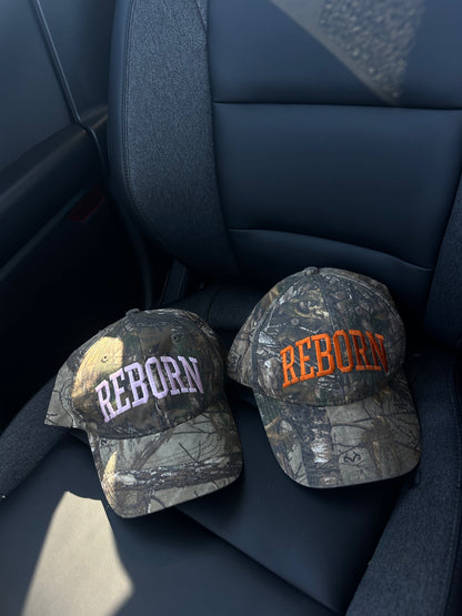 "REBORN" trucker hat in Pink Camo